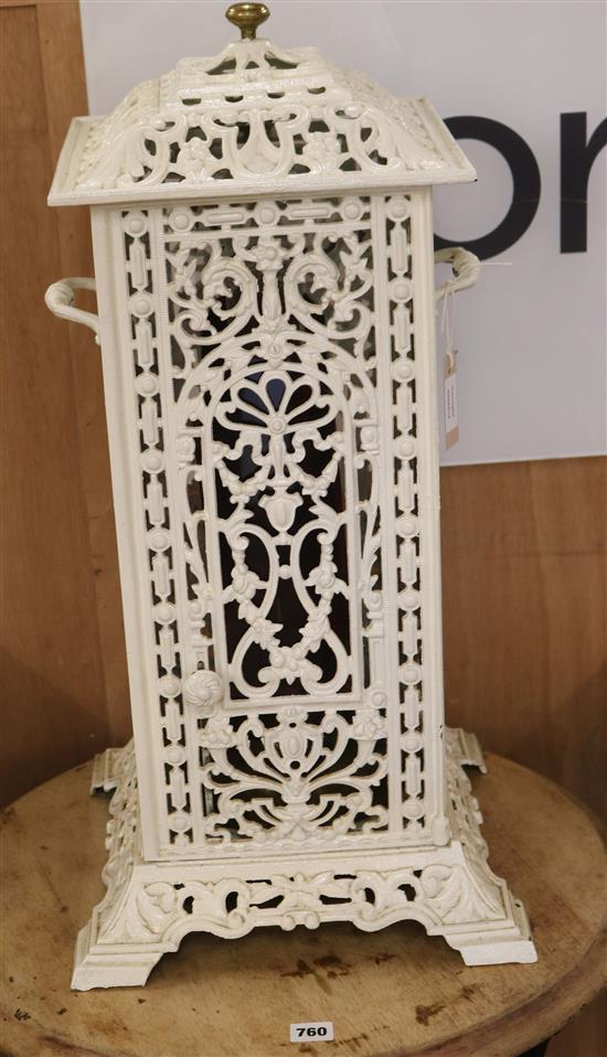 A late 19th century French white painted cast iron stove W.35cm